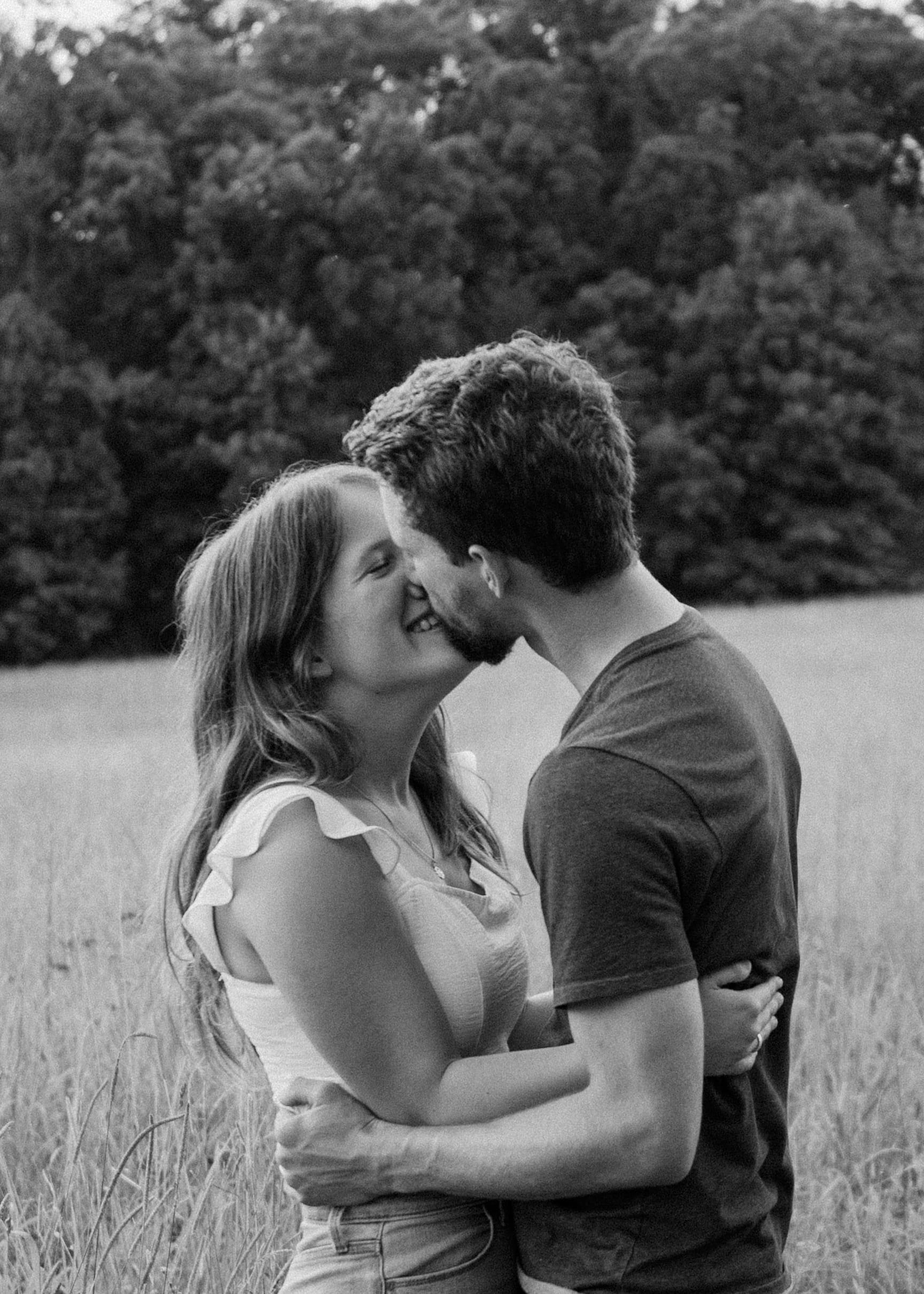 black and white couple in a field