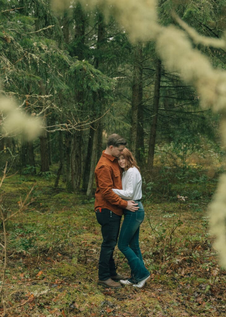 couple in the PNW forest 