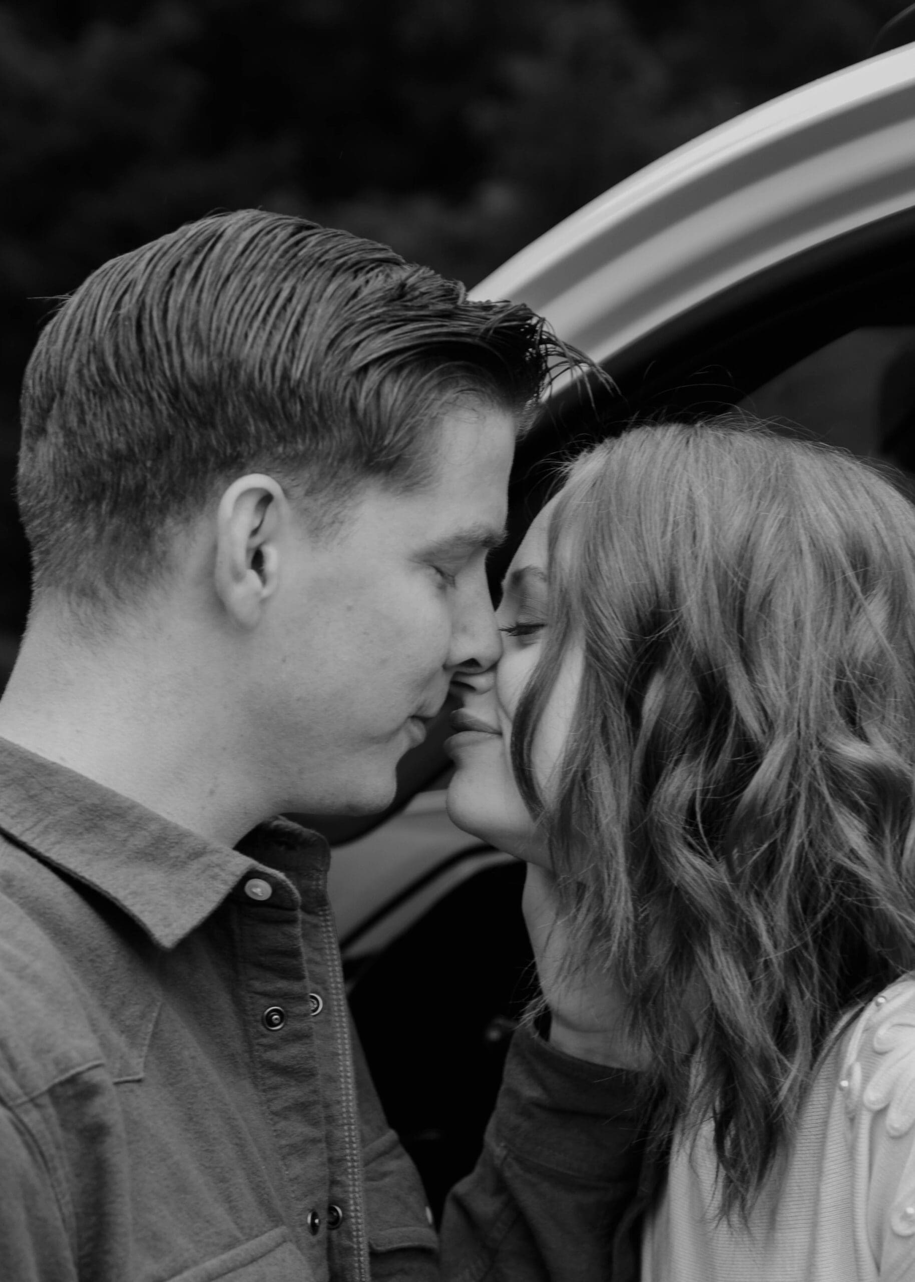 black and white couple almost kissing