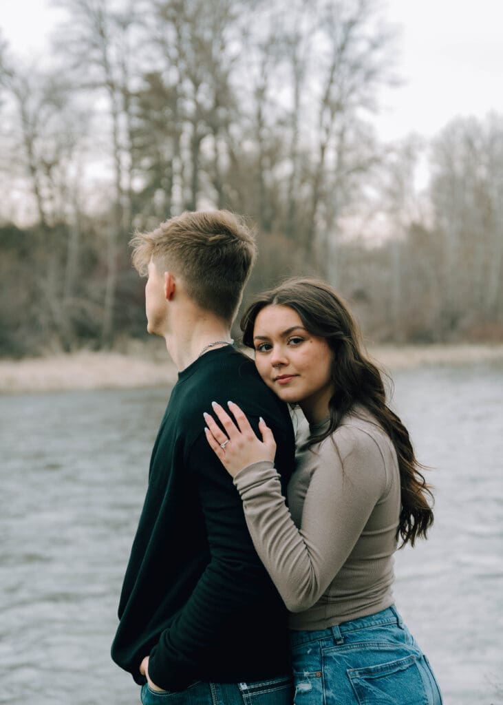 woman leaning against mans shoulder 