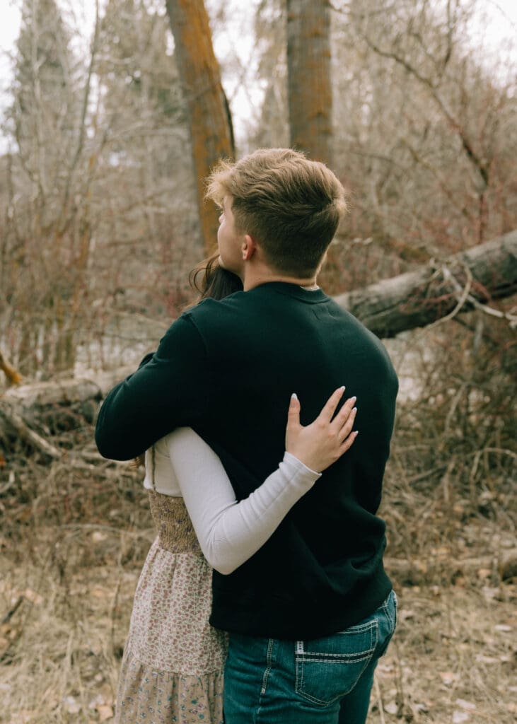 couple hugging after engagement