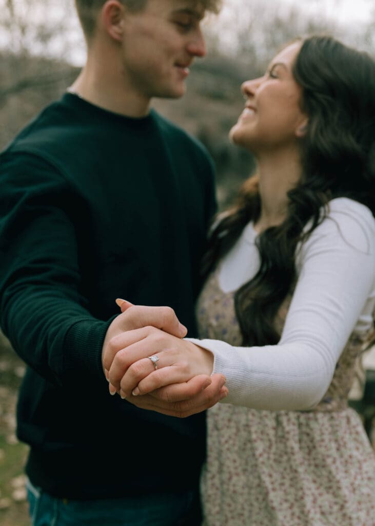 engagement ring photo during spring couples session 