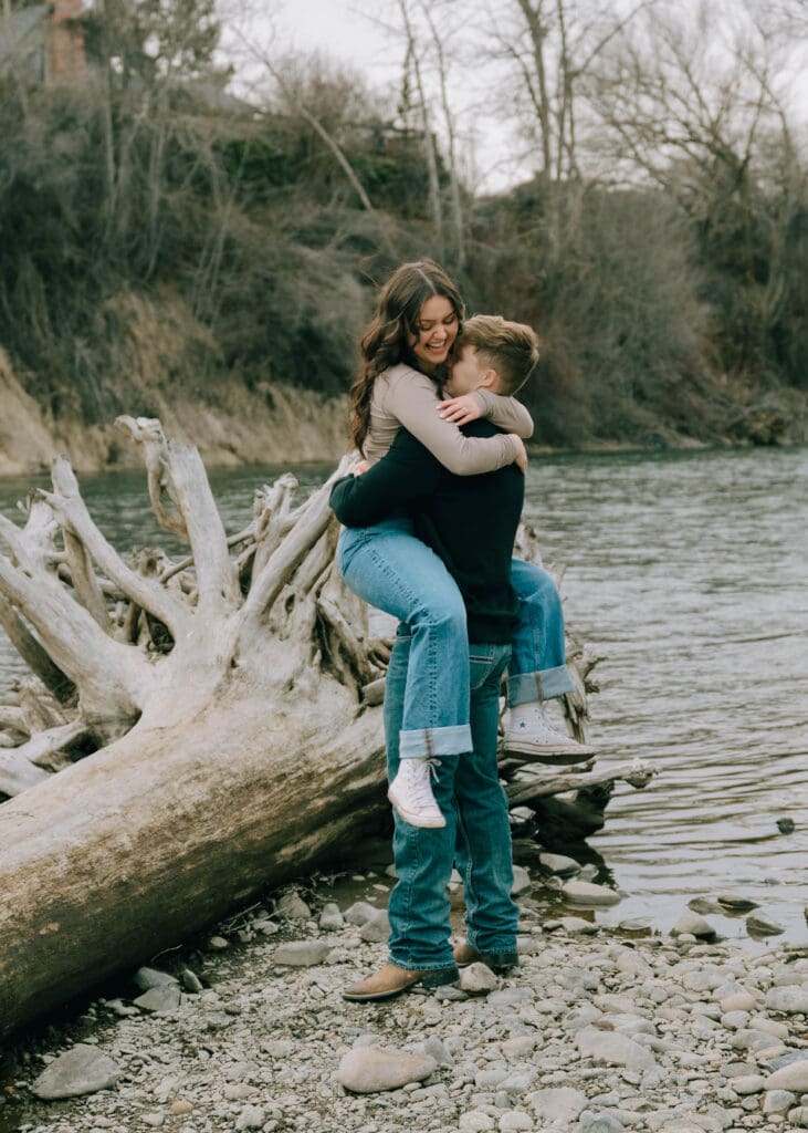 girlfriend jumping into boyfriends arms at the yakima river 