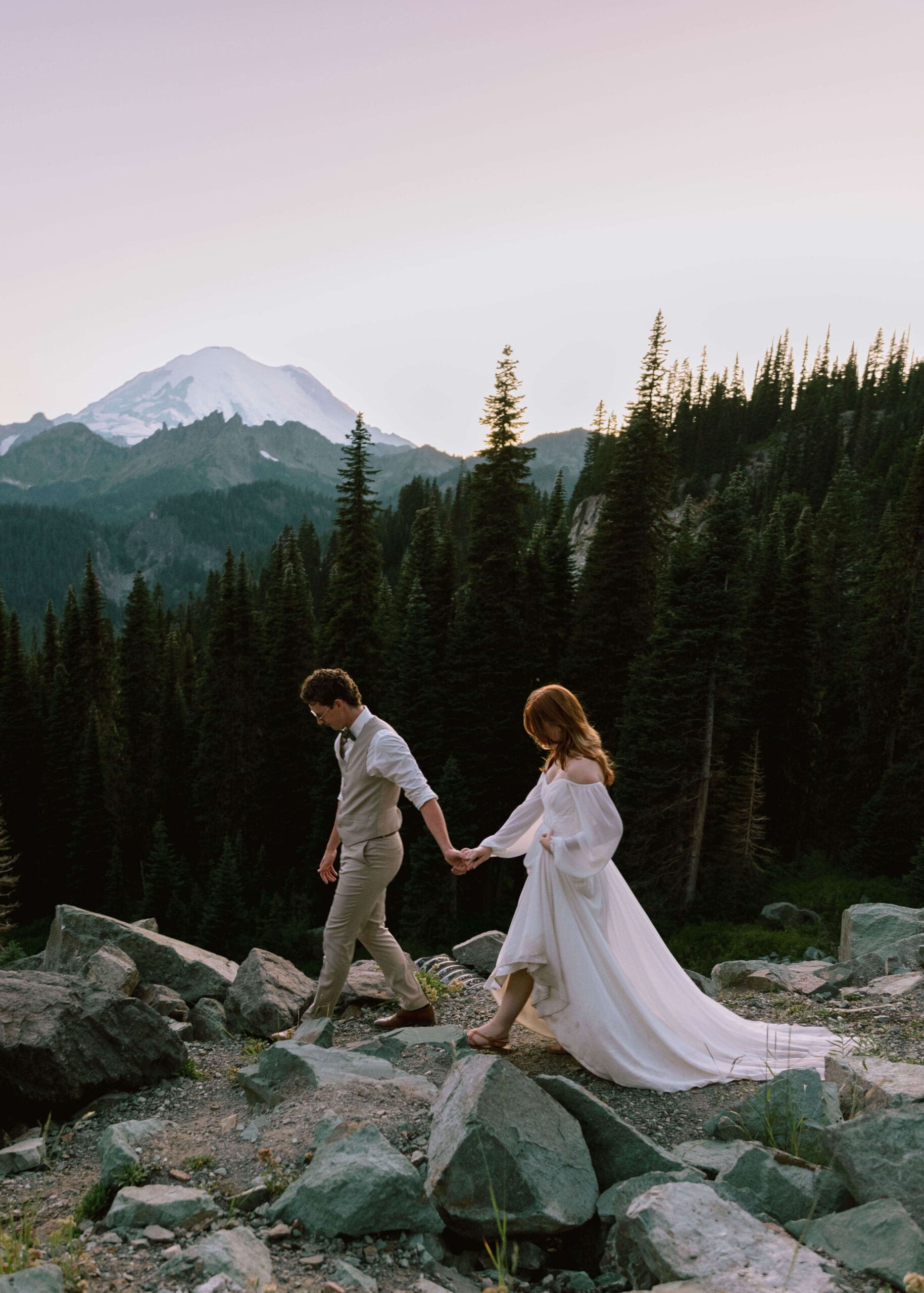 groom leading bride at Mt. Rainier