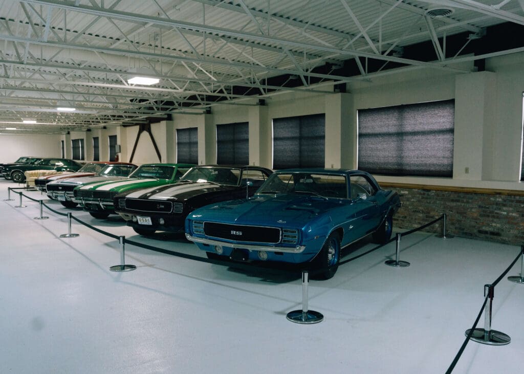 blue vintage car in indoor garage at Tacoma wedding venue 