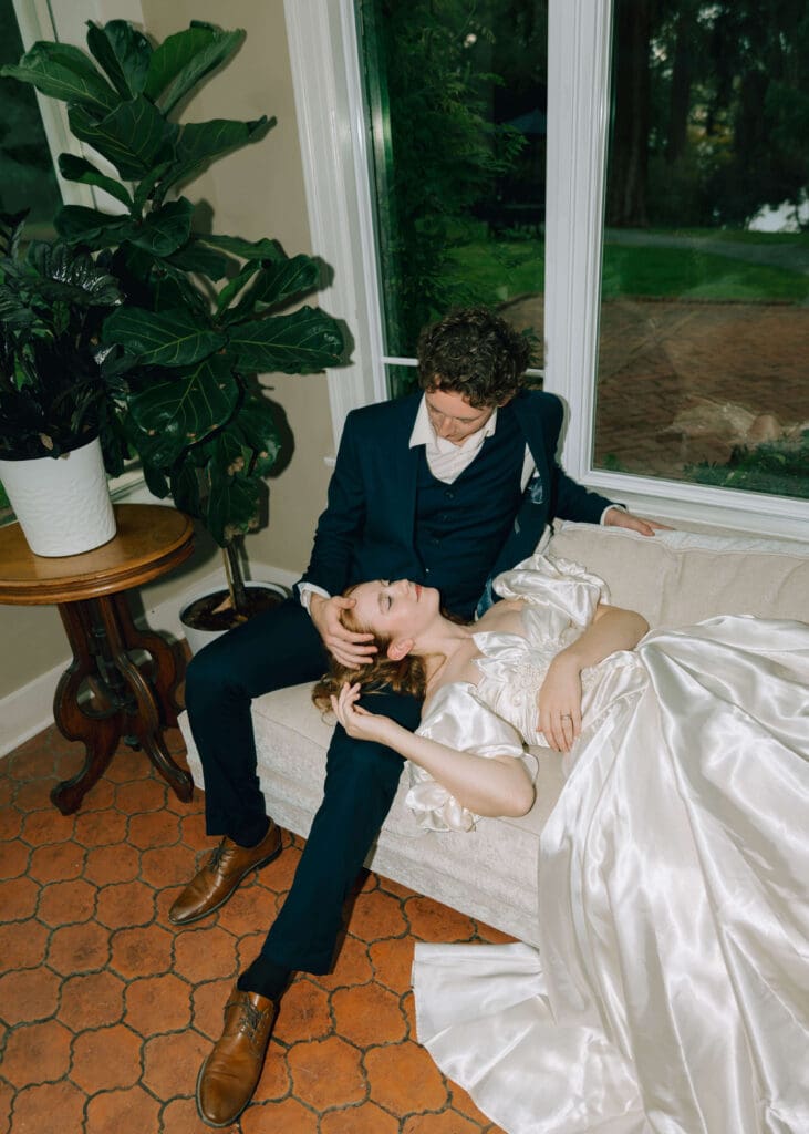 bride laying in groom's lap with help from tacoma wedding planners