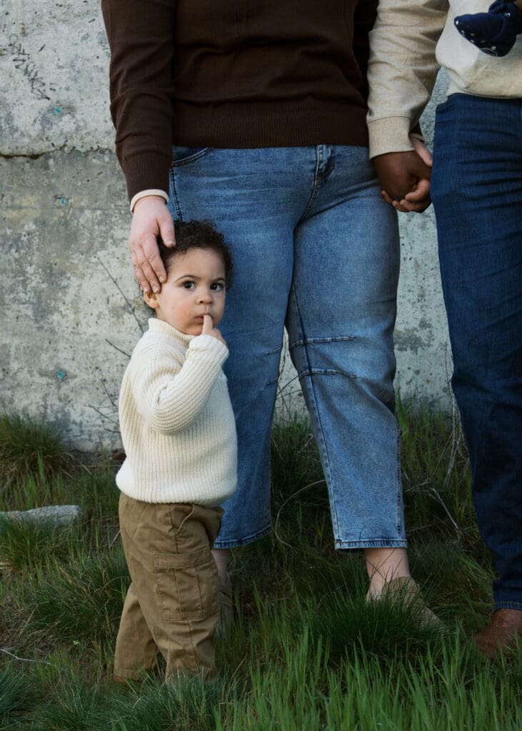 mother putting hand on sons head at Chambers bay family photos
