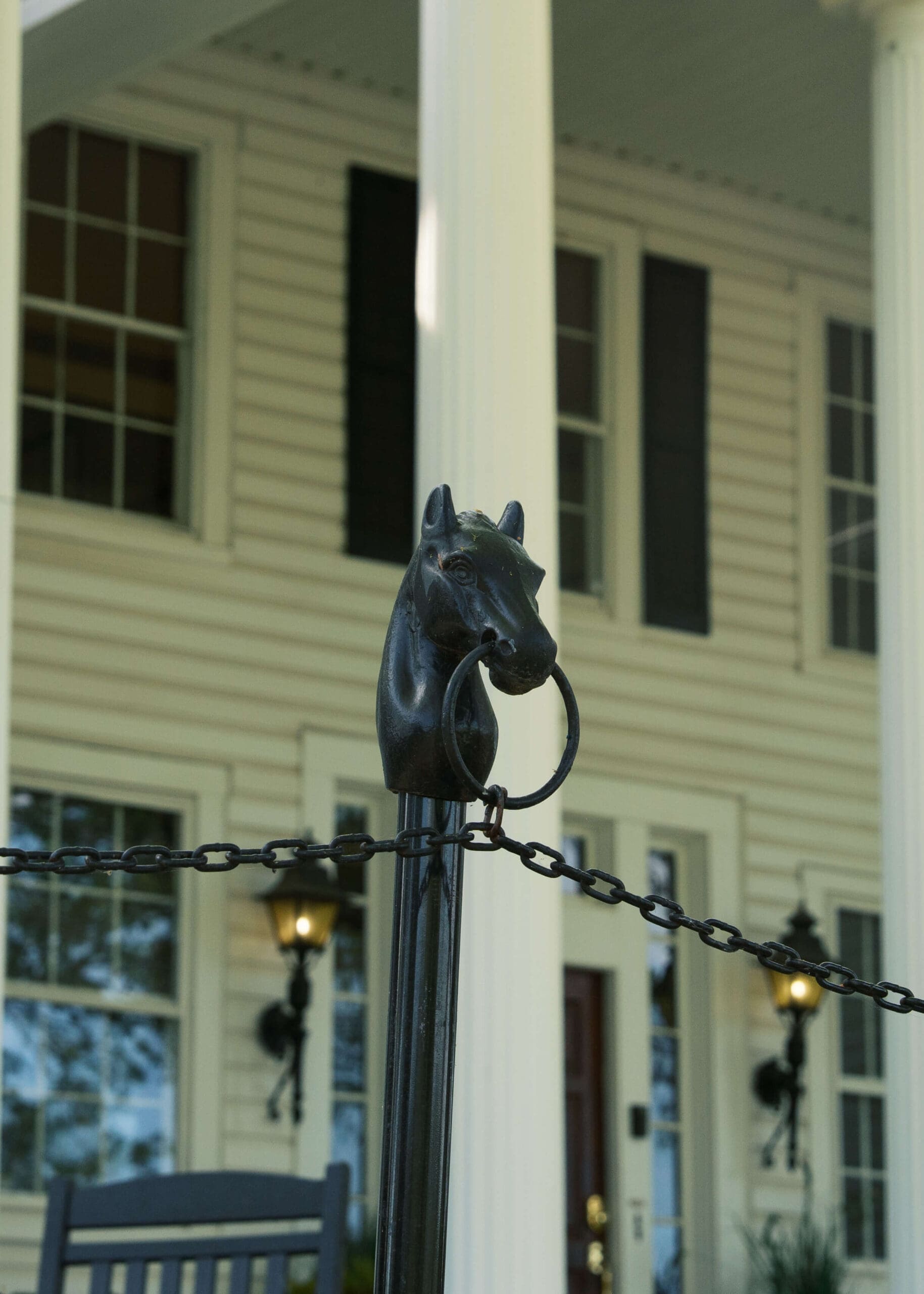 statue of a horse head outside black horse manor wedding venue