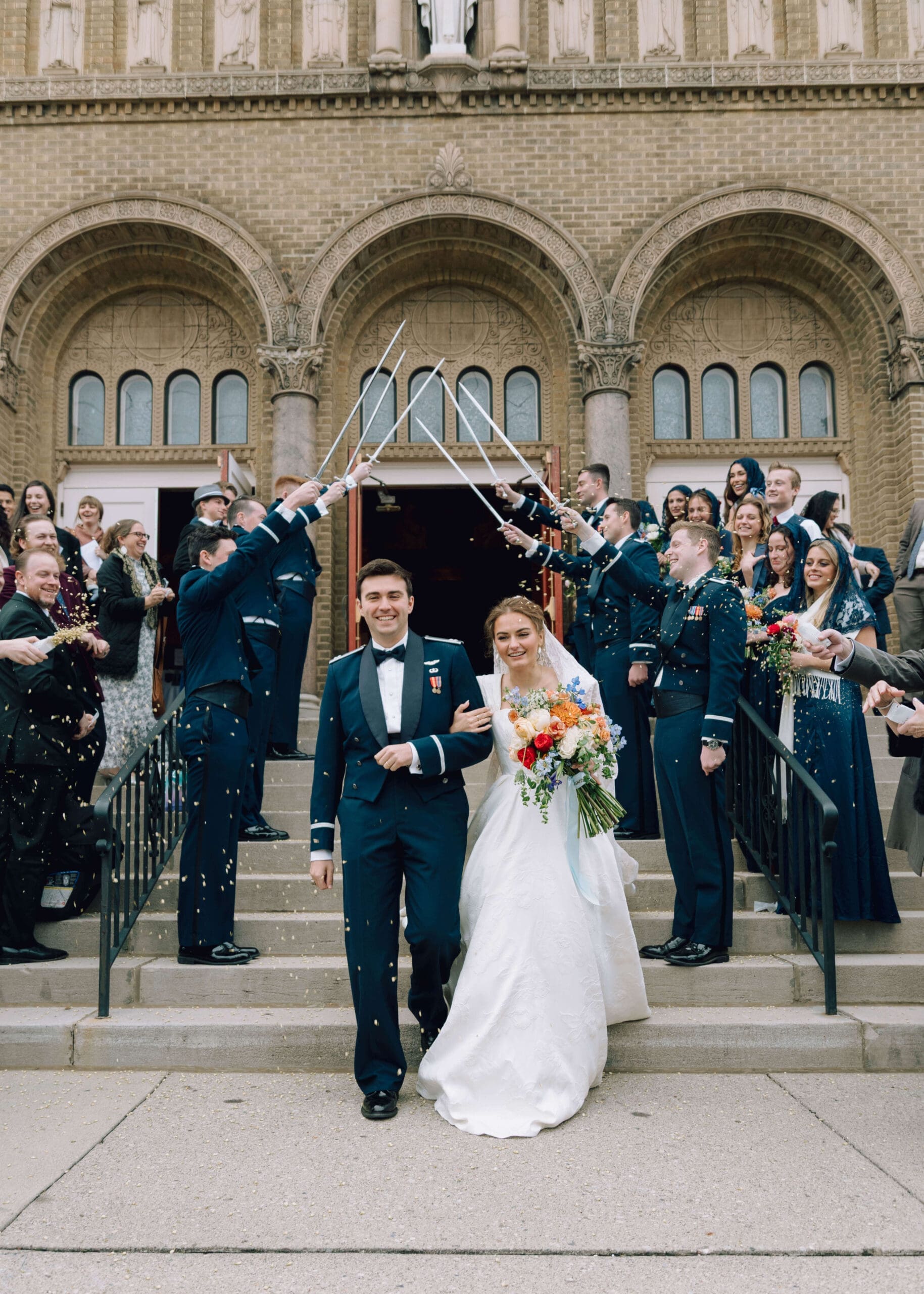 married couple walking out of a church after ceremony