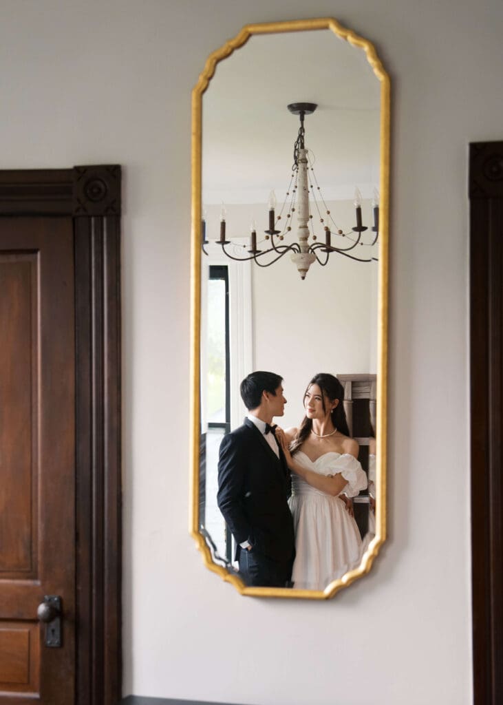 couple looking at each other in the mirror 