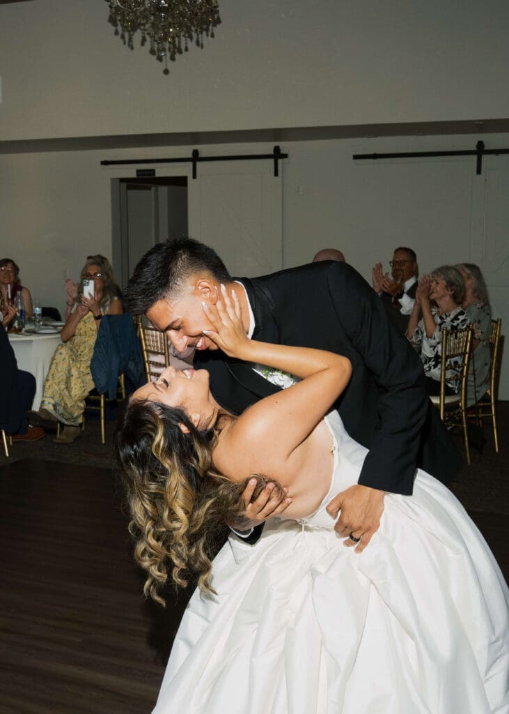 groom dipping his wife while dancing at wedding reception in Puyallup