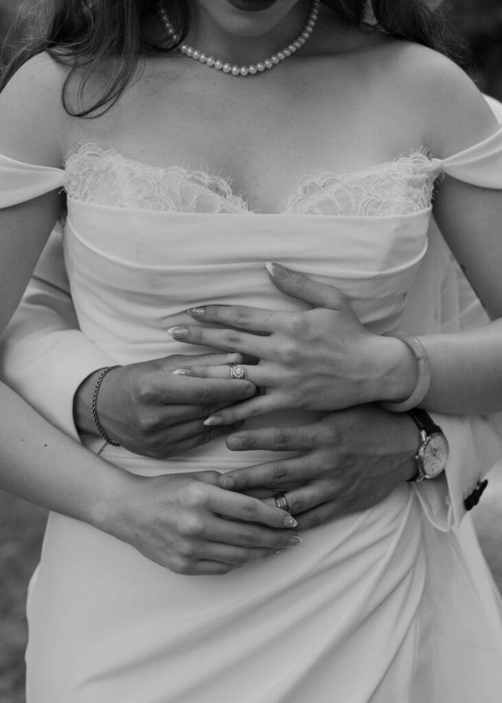 bride and groom putting each others rings on at the lodge at trinity tree farm